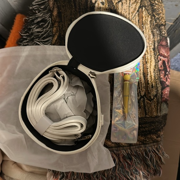 Brand new cute noodle’s crossbody with strap. - Picture 3 of 3